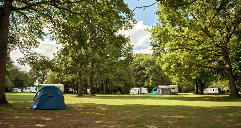 Mature taking a campsite shower